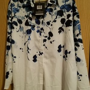 Light and airy soft polyester button down blouse. Accented blue flowers.